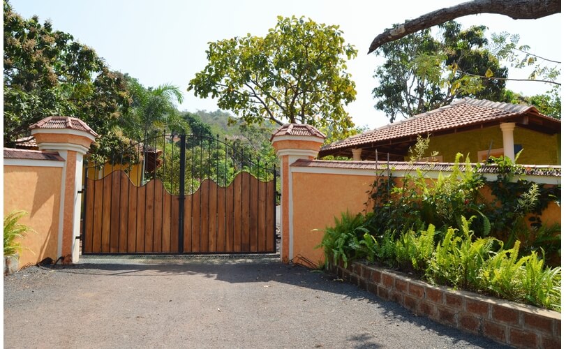 Wood and wrought iron main gates